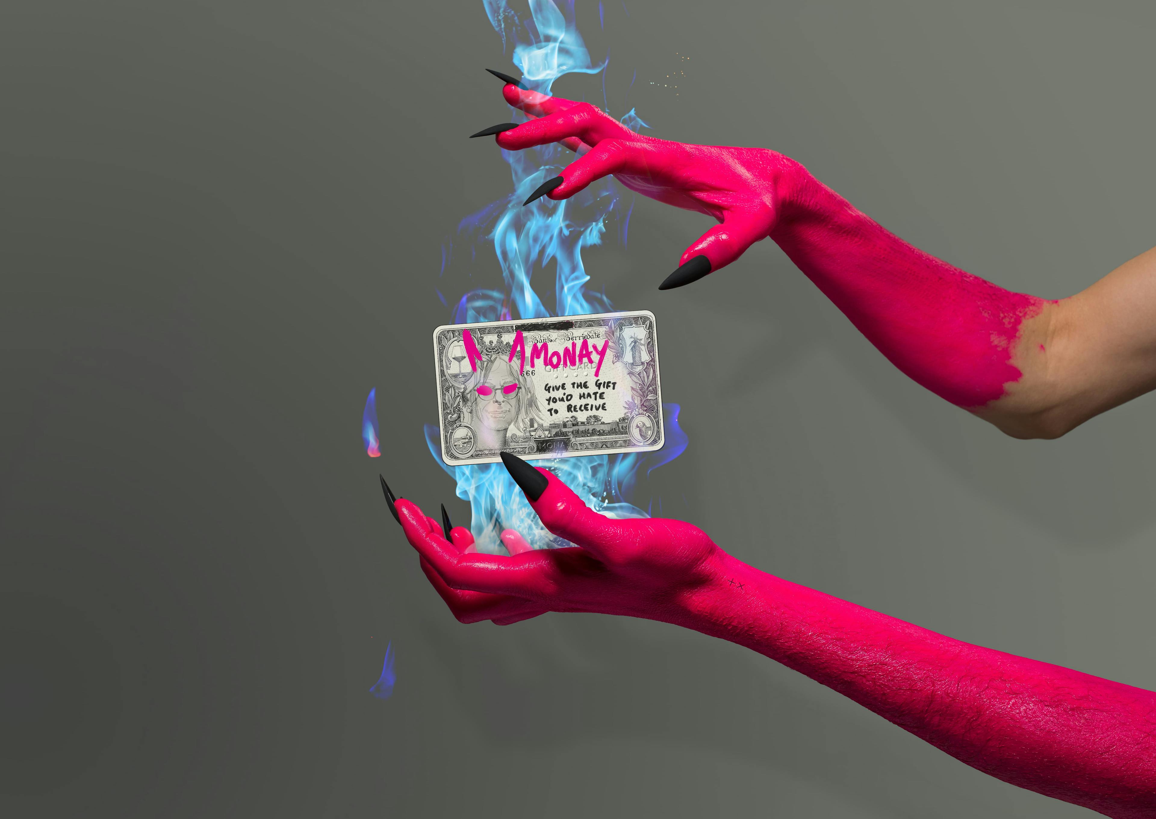 Pink hands with black claws holding blue flames and a Monay gift card.