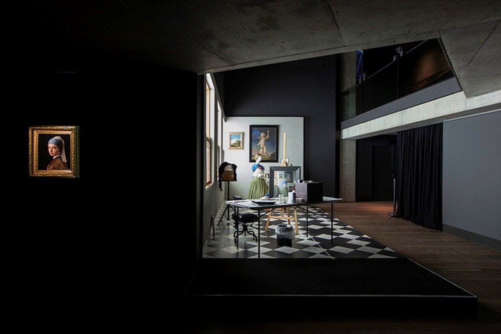 A gallery space styled like Vermeer's The Music Lesson