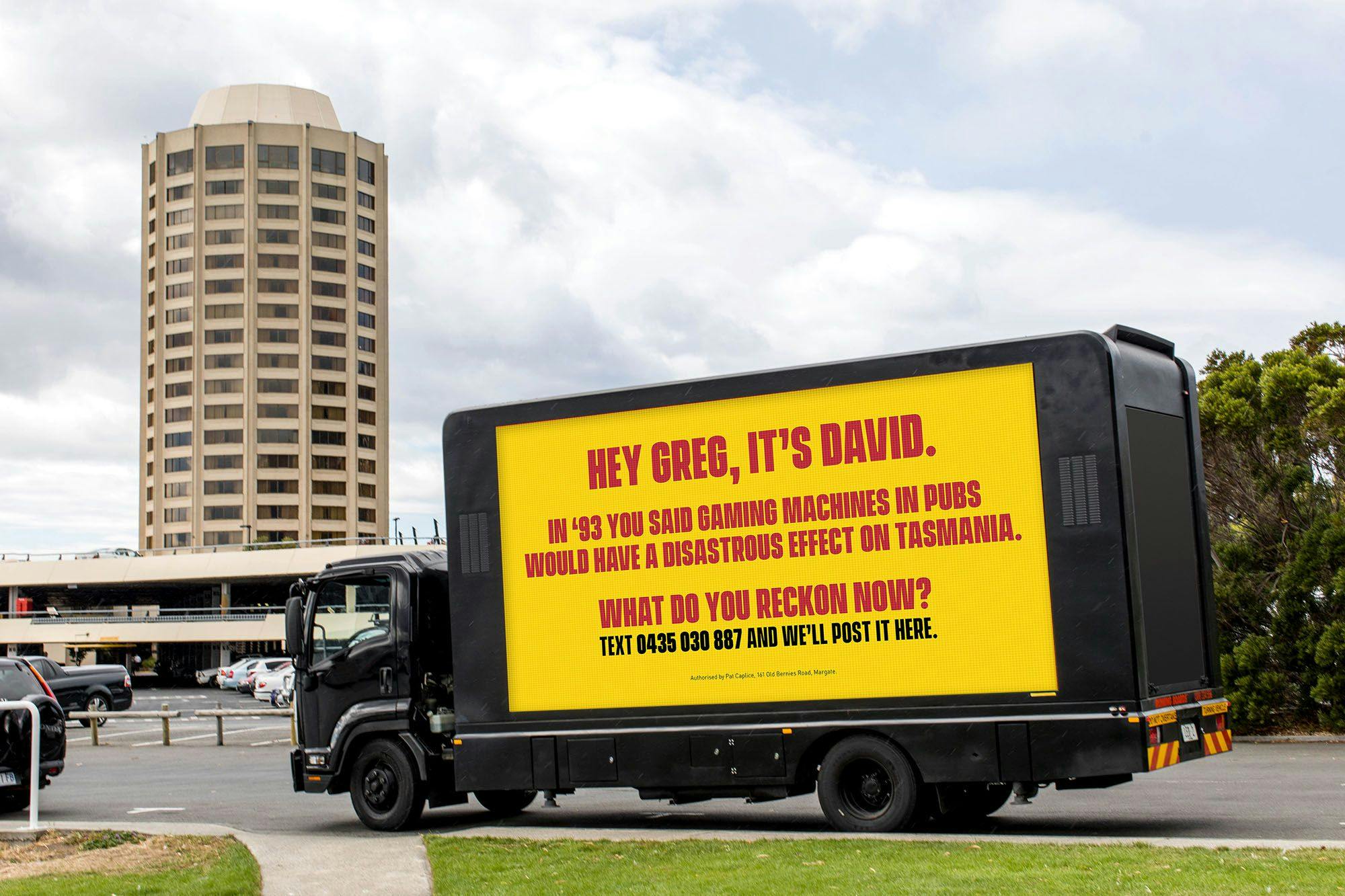 Truck outside Wrest Point Casino with a message from David to Greg
