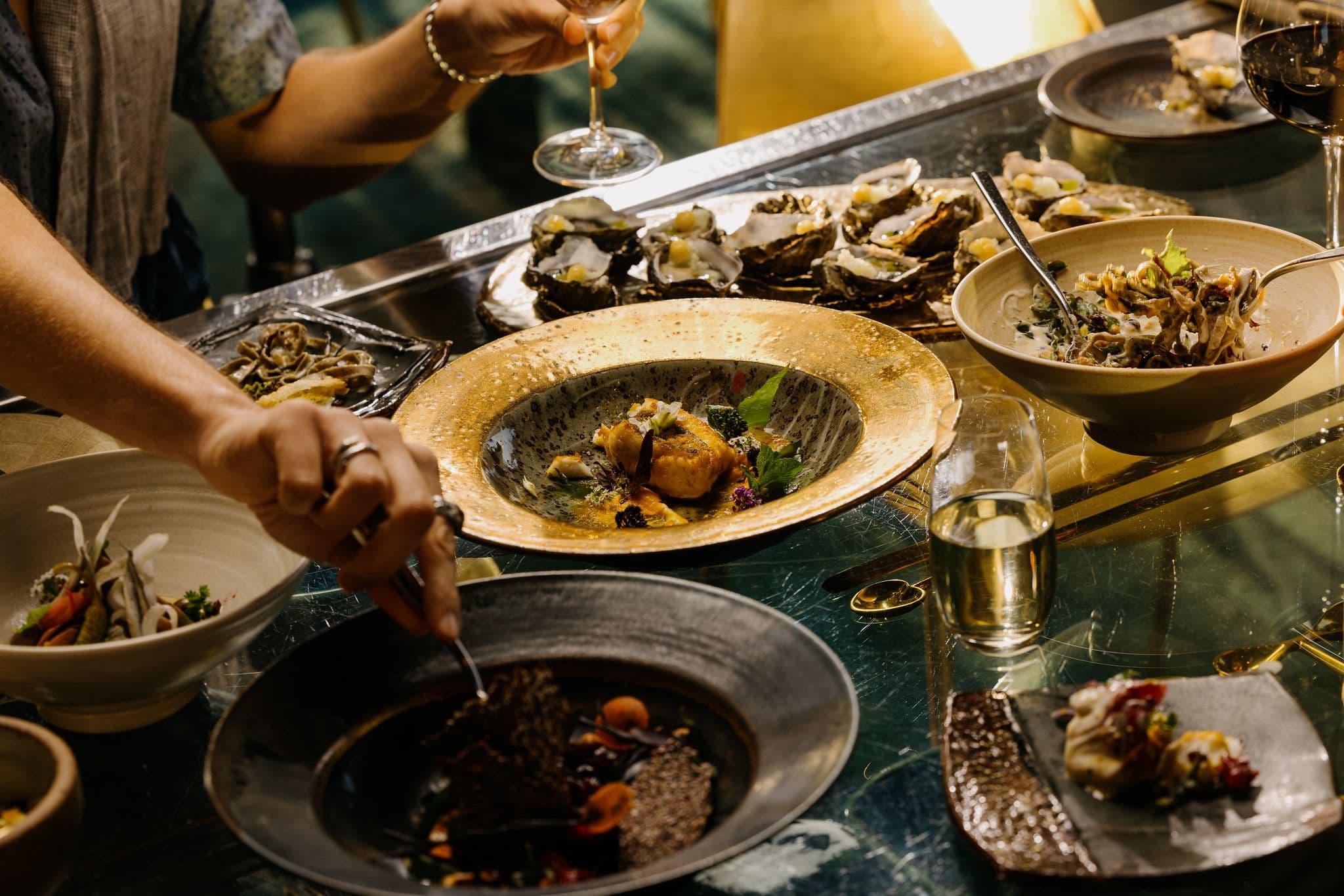 Beautiful cuisine on multiple plates in bowls