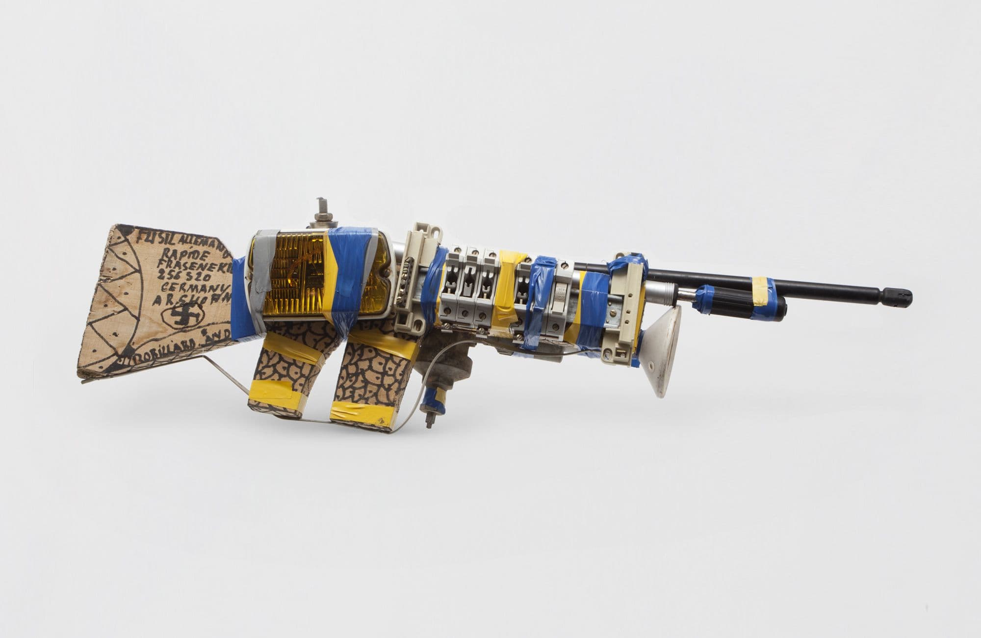 A make shift gun made with various materials