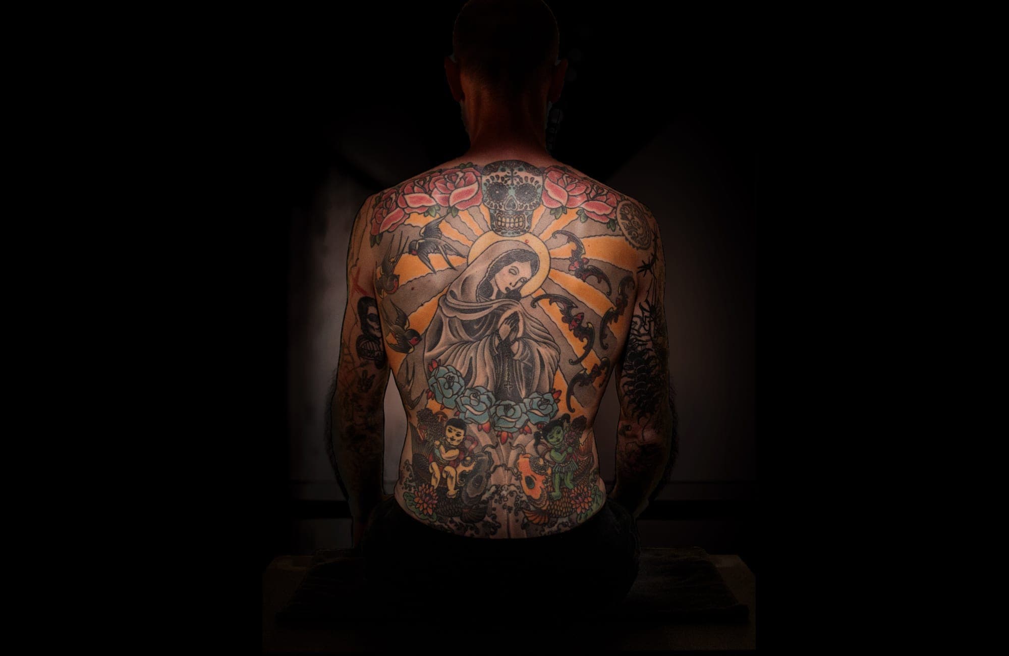 Photo of a back fully covered in a tattoo