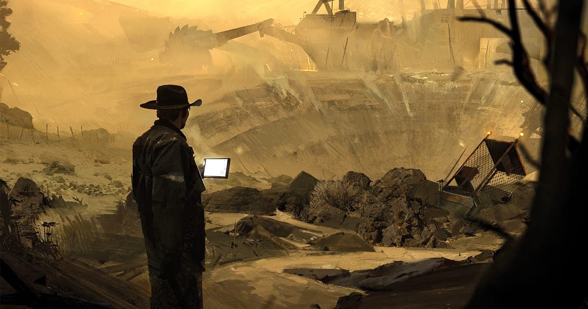 A man in a hat stands before a mine shaft of rubble, device lit up in hand